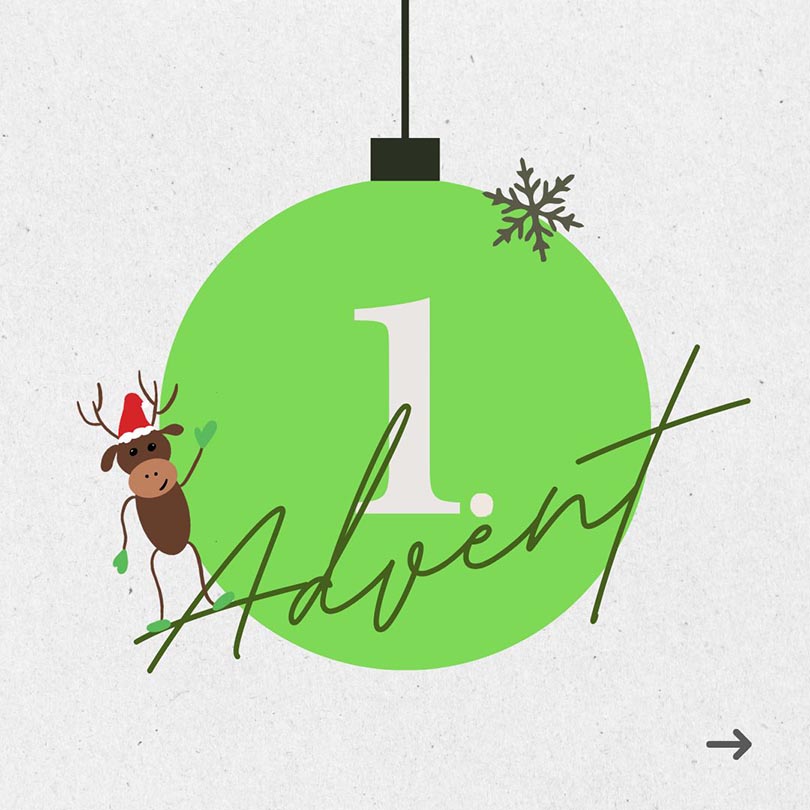 Eine Christbaumkugel in grün mit der Ziffer Eins darauf, symbolisch für den ersten Advent. 