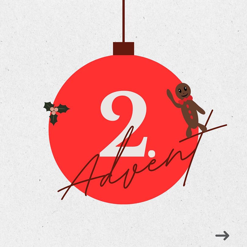 Eine Christbaumkugel in rot mit der Ziffer Zwei darauf, symbolisch für den zweiten Advent. 