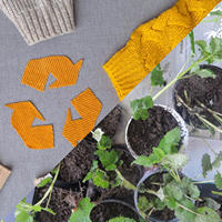 Tauschpartys Symbolbild mit Pullis und Pflanzen.